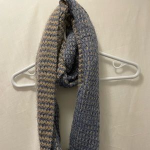 Simply Noelle infinity knit scarf. Acrylic and nylon based. Tan and blue